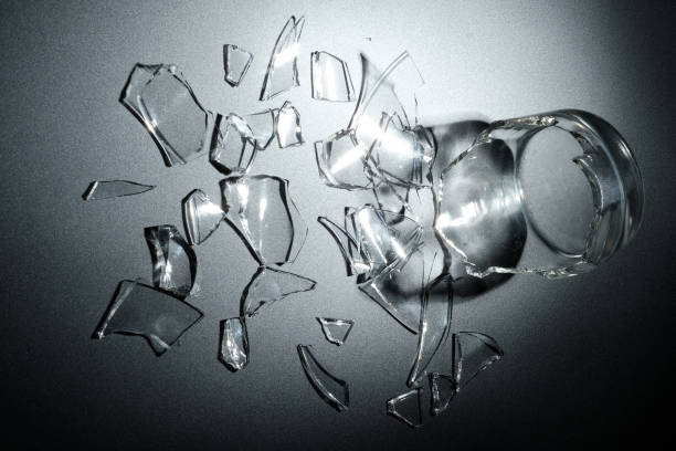 istock A breaking glass of water on the black background 827238666