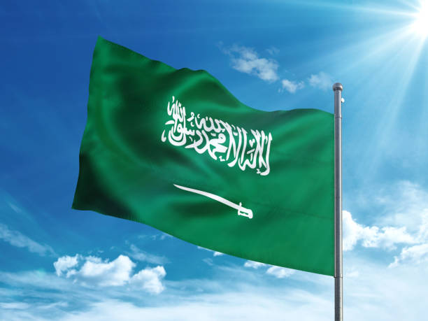 istock Saudi Arabia flag waving in the blue sky 827242172