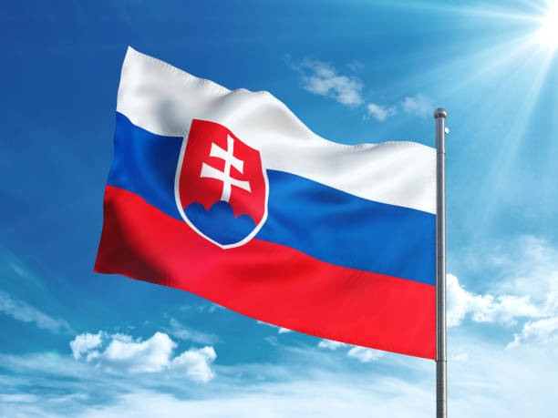 istock Slovakia flag waving in the blue sky 827242224