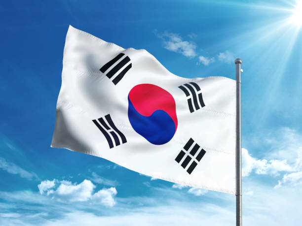 istock South Korea flag waving in the blue sky 827242274