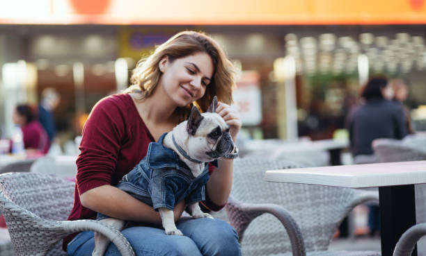 istock Redhead girl with dog 827243482