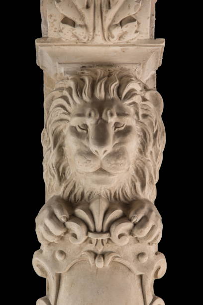 istock plaster lion sculpture, pommel column on a black background 827245910