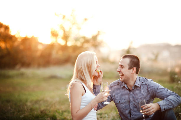 istock Couple in love at a picnic park 827245966