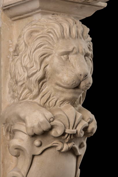 istock plaster lion sculpture, pommel column on a black background 827246256