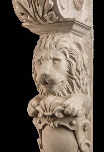 istock plaster lion sculpture, pommel column on a black background 827246410