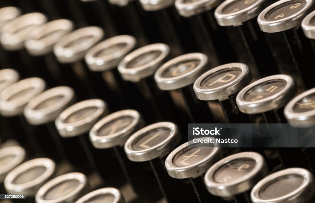 Old typewriter keys Close up of old, dusty typewritter keys with copy space Alphabet Stock Photo