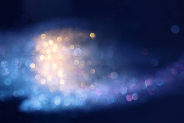 istock Golden and blue defocused lights background 827252294