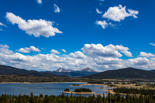 Dillon Reservoir, sometimes referred to as Lake Dillon, is a large fresh water reservoir located in Summit County, Colorado, and is a reservoir for the city of Denver. Popular ski areas are close to the reservoir, including Copper Mountain, Keystone, Arapahoe Basin, and Breckenridge.