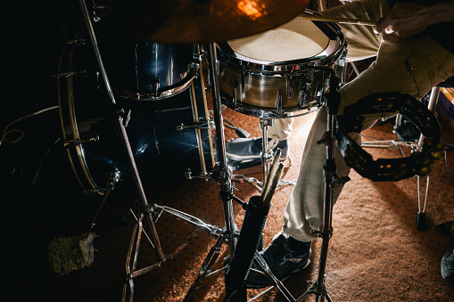 Drum kit during live concert closeup. Professional background. Atmospheric rock show