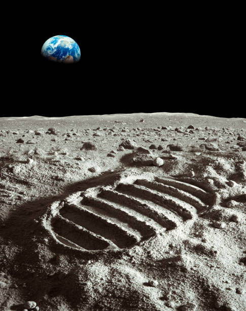 Footprint of astronaut on the moon Footprint of astronaut on the moon with earth above the horizon. Photo of the earth has been used with courtesy of NASA database. Photo of the moon surface and the footprint has been created in the studio. moon stock pictures, royalty-free photos & images