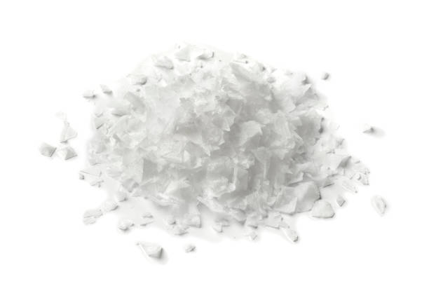 istock Heap of white salt flakes 827263168