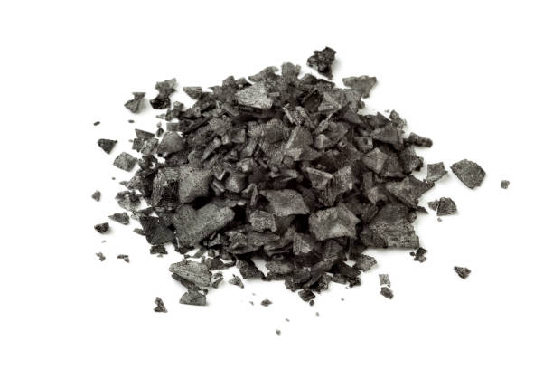 istock Heap of black salt flakes 827263194