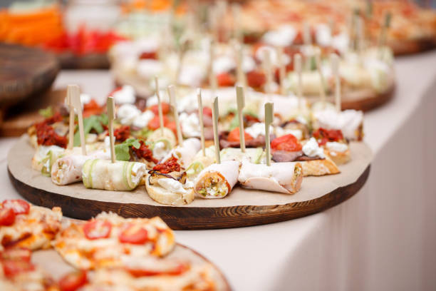assorted canape with cheese, meat, rolls, bakery and vegetables. selective focus - bruschetta buffet party food imagens e fotografias de stock