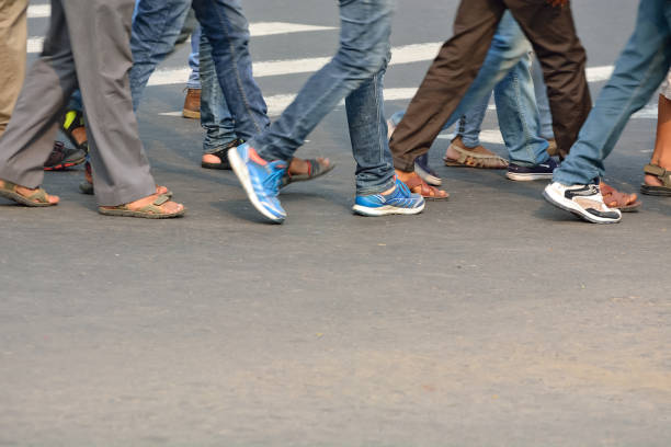 istock Pedestrians crossing road 827269722