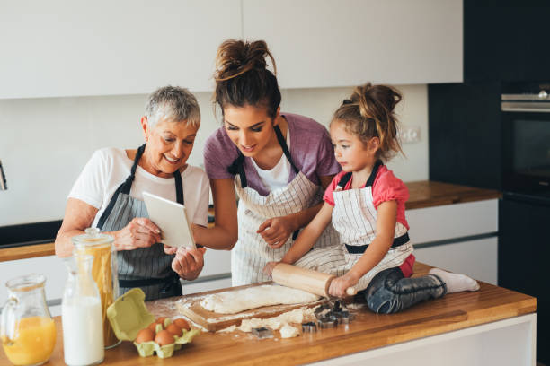 istock Family cooking in the kitchen 827269998