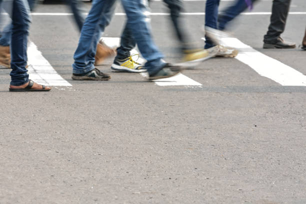 istock Pedestrians crossing road 827270142