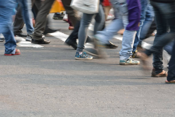 istock Pedestrians crossing road 827270276