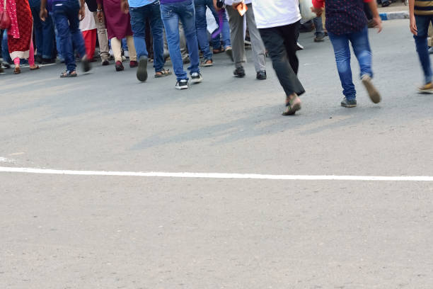 istock Pedestrians crossing road 827273032