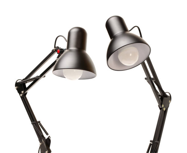 istock Vintage black desk lamp isolated on white 827273298