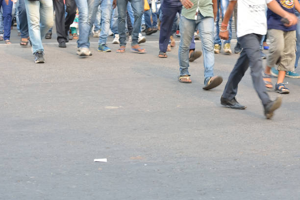 istock Pedestrians crossing road 827273358