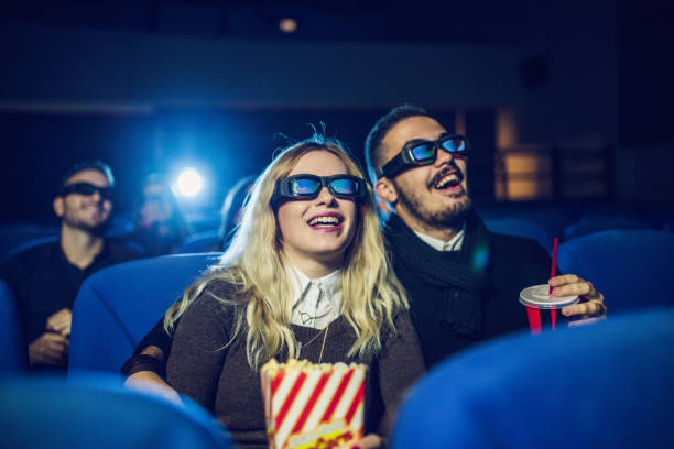 istock Young couple watching movie 827279696
