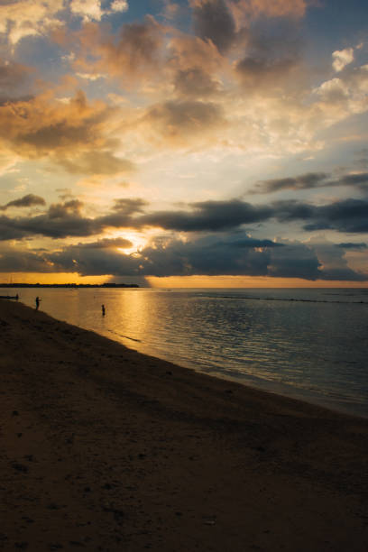istock beautiful sunset from the beach in Indonesia 827279778
