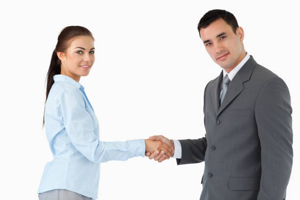 istock Young business partners shaking hands 827280362