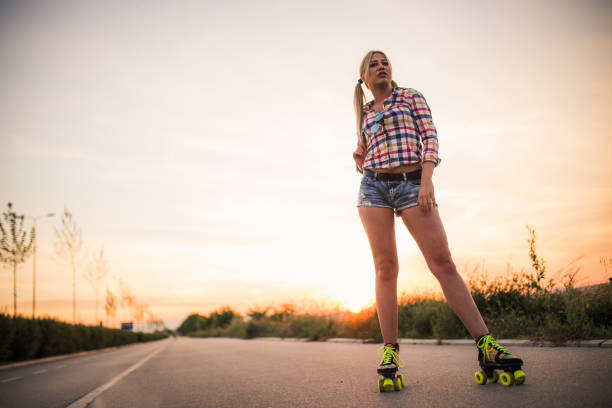 istock Blonde woman with rollers standing on the road 827287014