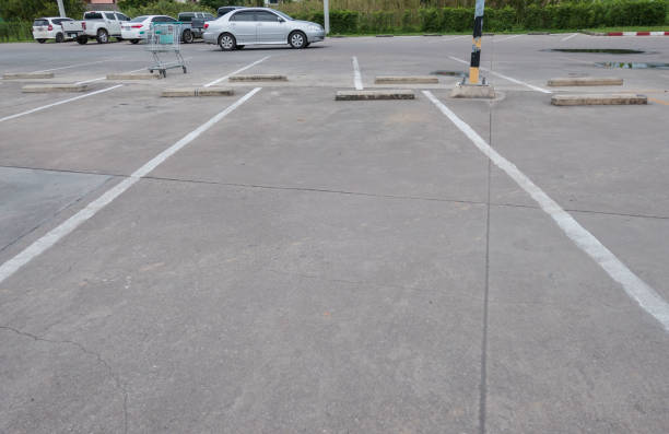 istock empty space for cars ,outdoor car parking 827288222