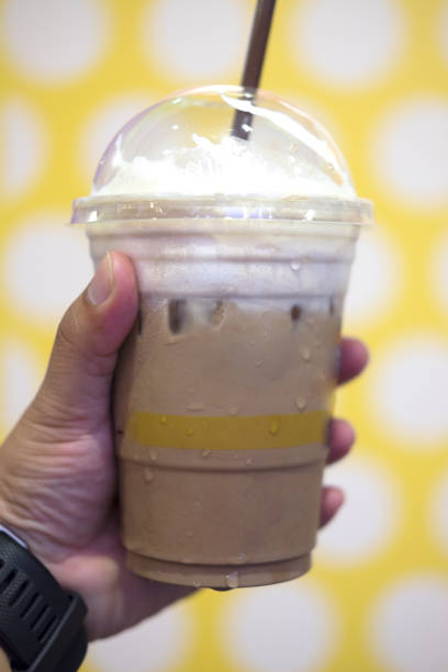 istock Chocolate frappe with whipped cream in plastic glass 827288320