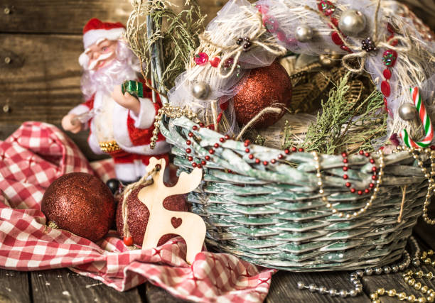 istock Christmas basket on wooden background 827292158