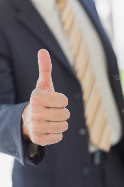 istock Businessman showing thumbs up 827295110