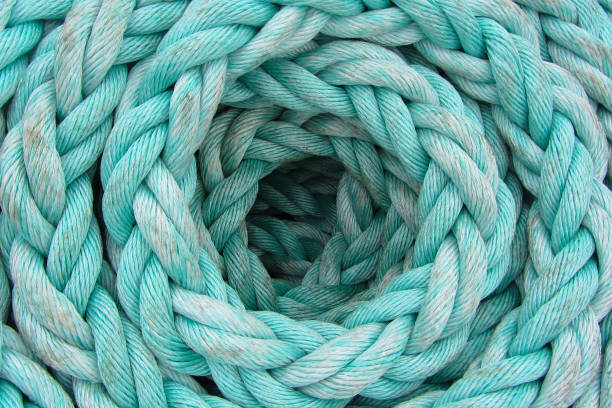 the light-blue rope is twisted by a ring, background, texture - nautical vessel fotos imagens e fotografias de stock