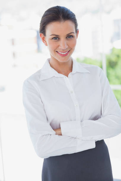 istock Businesswoman standing in the workplace 827295384