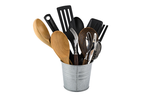 black plastic, wooden, metal kitchen set skimmer, spade of frying pan in metal box isolate white background with clipping path