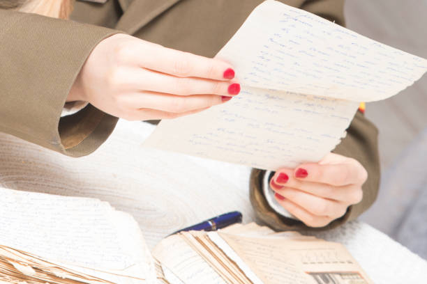 istock A girl reads an old letter has survived over the years. 827299570