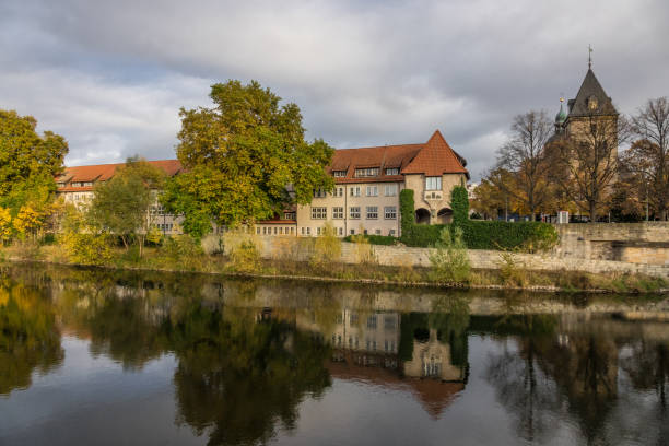istock The old city Hamelin on a river, Germany 827303156