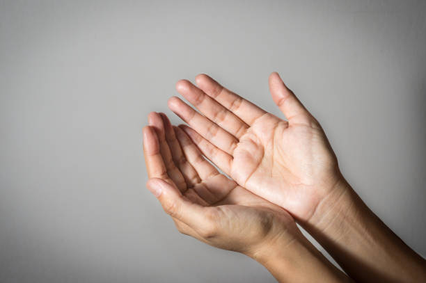 istock Girl hands, palm up, concept idea. 827305484