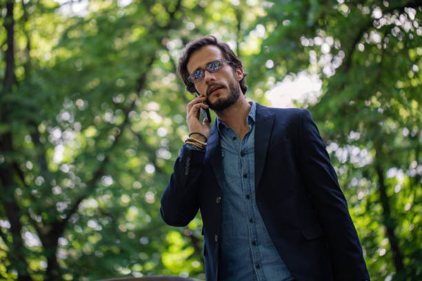istock Business conversation in the city park 827311510
