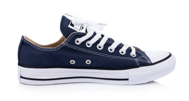 istock Classic white sneakers isolated on white background 827318774