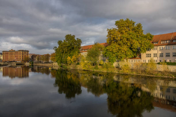 istock The old city Hamelin on a river, Germany 827324240