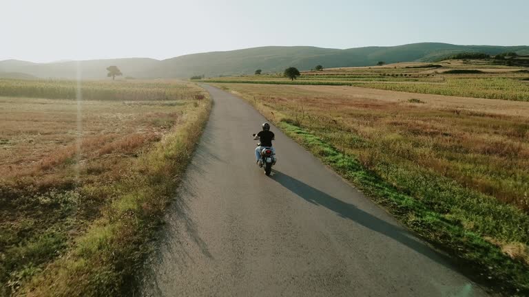 Riding a motorcycle in the countryside