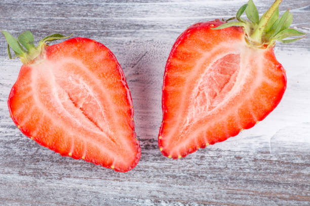 istock strawberries on wooden 827328786