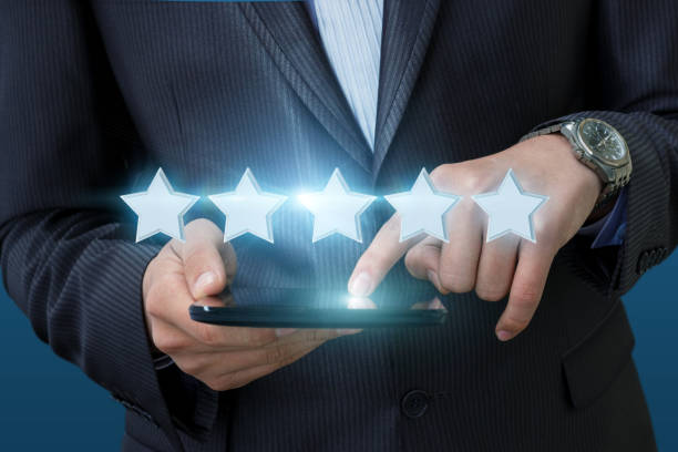 istock Businessman clicks on the rating in the computer. 827341320