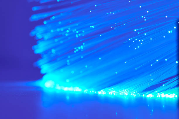istock Background With Blue Fiber Optics 827341866