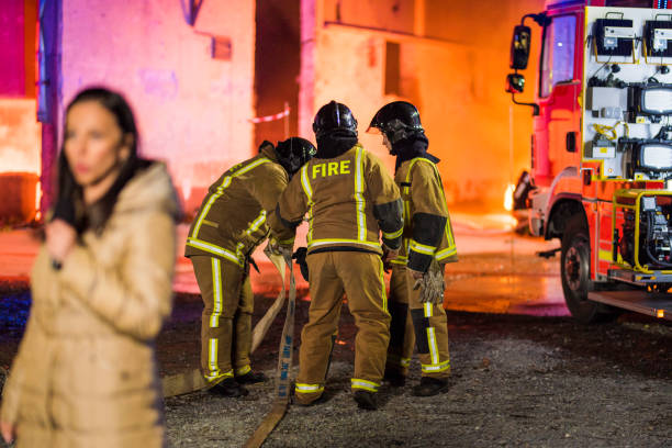 istock TV news about brave firefighters 827344114