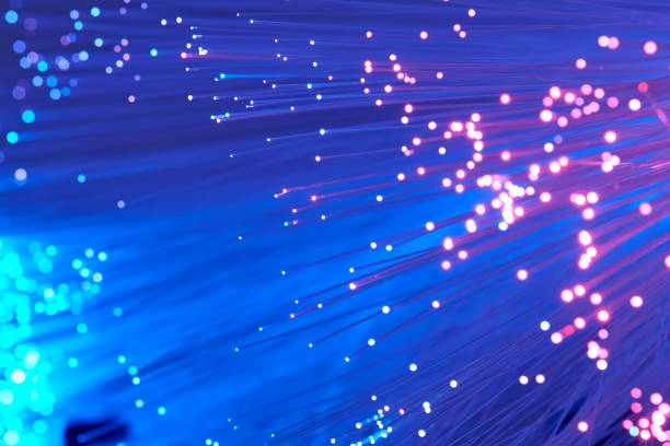 istock Red And Blue Fiber Optics Closeup 827344442