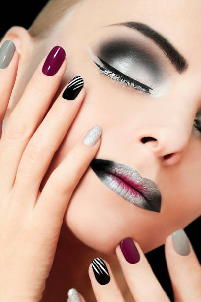 istock Black silver glamorous makeup and manicure. 827345078