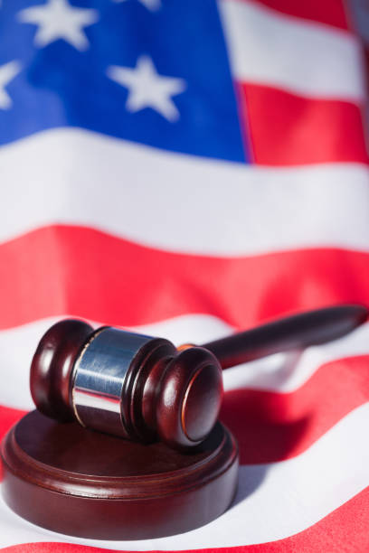 istock US flag and brown gavel 827348170