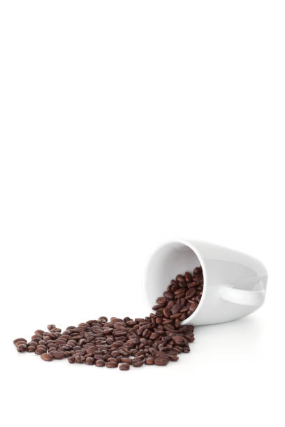 istock Spilled cup of coffee beans 827348278